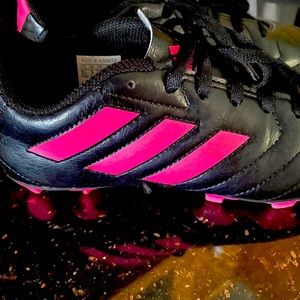 Worn 4 times. Size 3 1/2 cleats. Adidas girls
